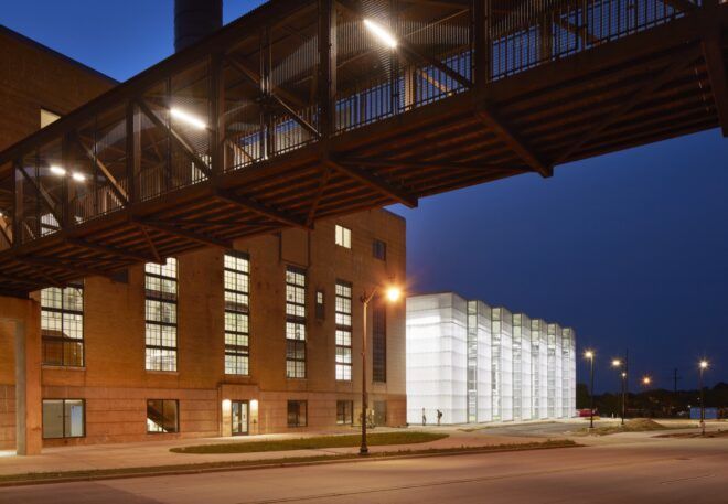 An elevated bridge crossing over a street.