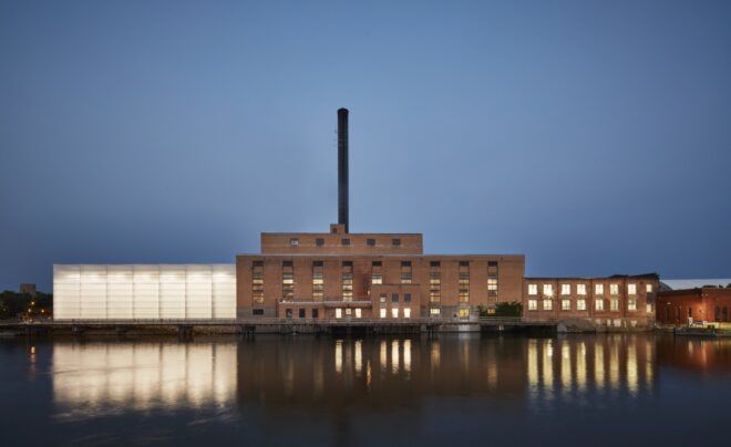 A brick building on the river.