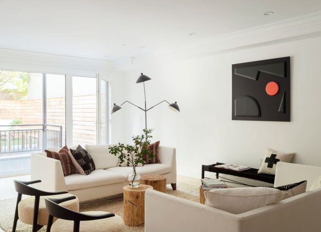 white room with white sofas