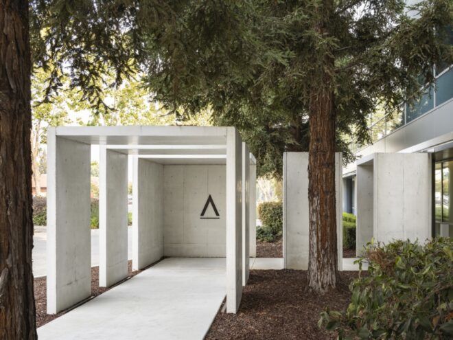 white rectangular archways over a path