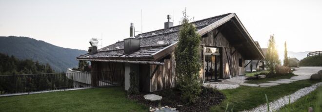 old wood barn on hillside