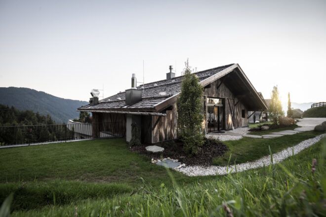 old wood barn on hillside