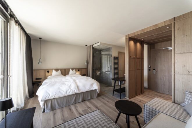 large white bed in beige room