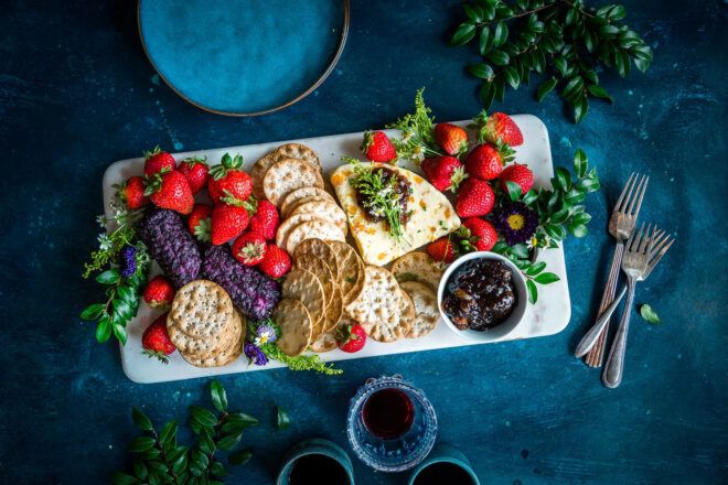 platter of cheeses and fruits