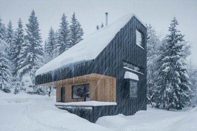 angled cabin covered in snow