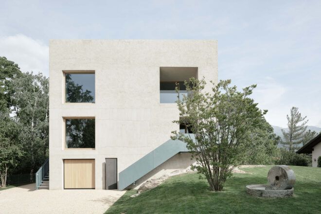 large stone cube home