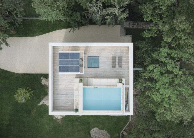 pool, hot tub and solar panels on a roof