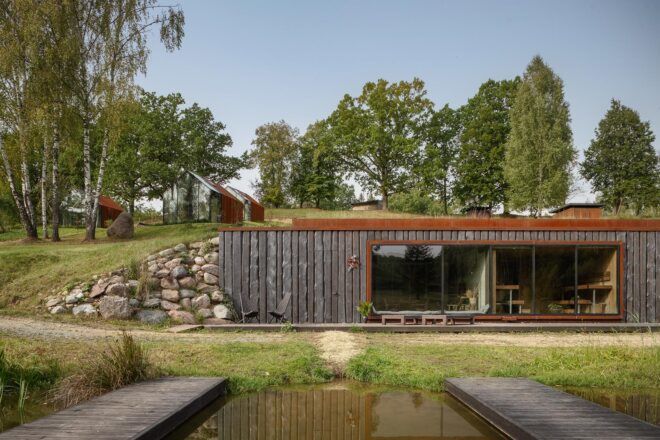 long dark building built into a hillside