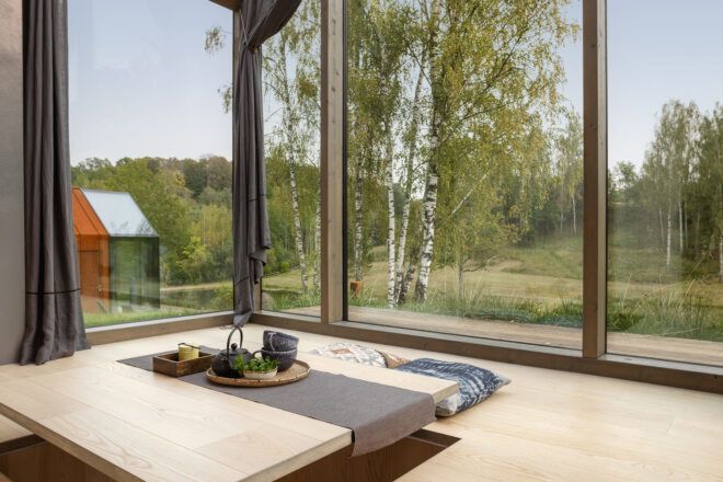 large, low-lying table in room with glass walls