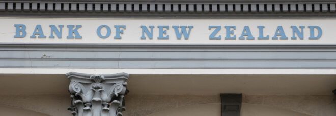 building sign that reads, "Bank of New Zealand"