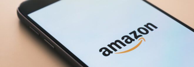 phone with Amazon website on the screen