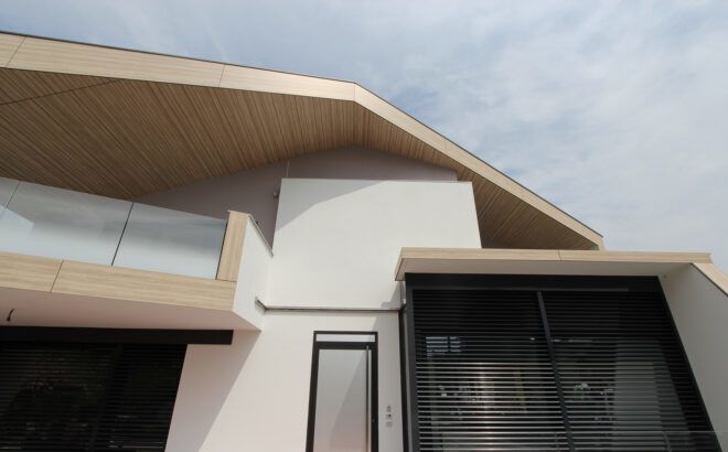view of sharply pointed wood roof