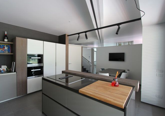 gray and white kitchen with large island