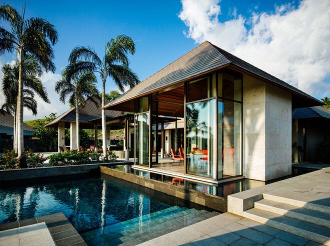 pool next to white building