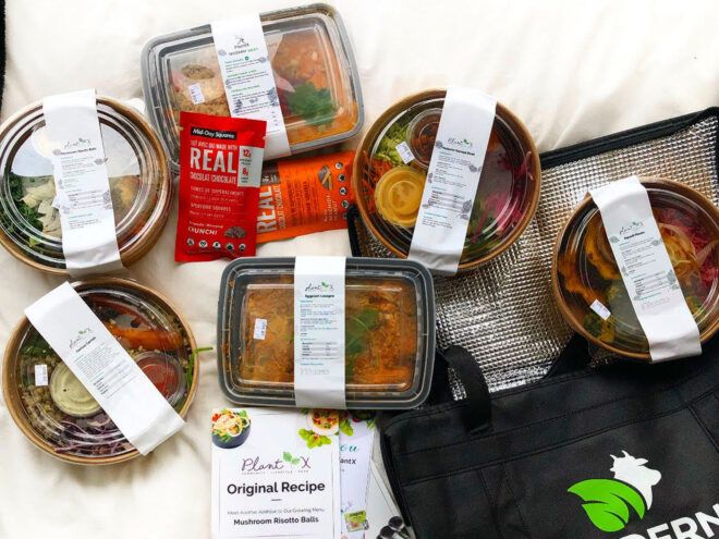 meal delivery items near black reusable bag