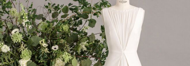 close-up of wedding dress with cinching along the front