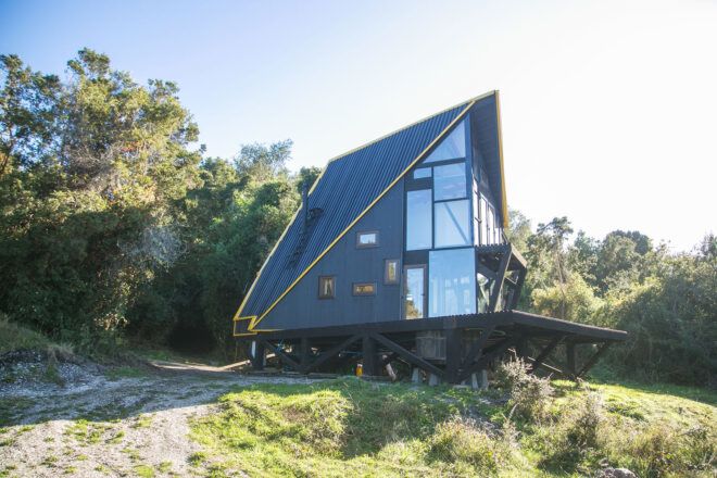 wood cabin with angled roof