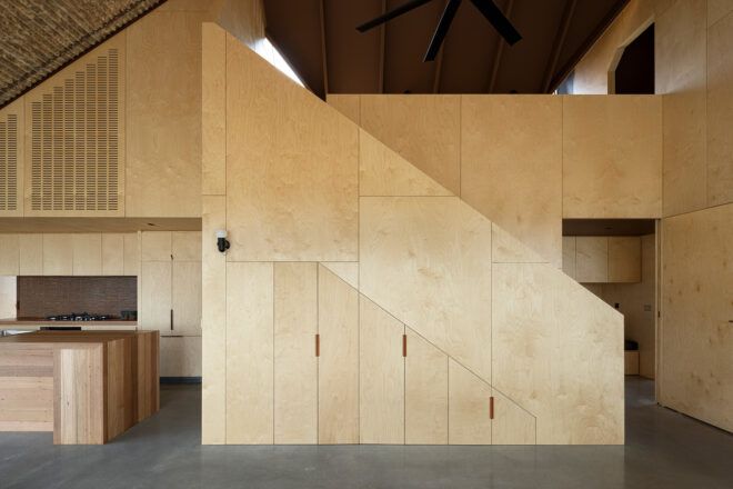 doors built into side of wood staircase
