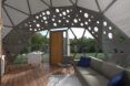 rendering of sofa inside a geodome