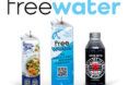 Two cartons and one bottle of water sit under the 