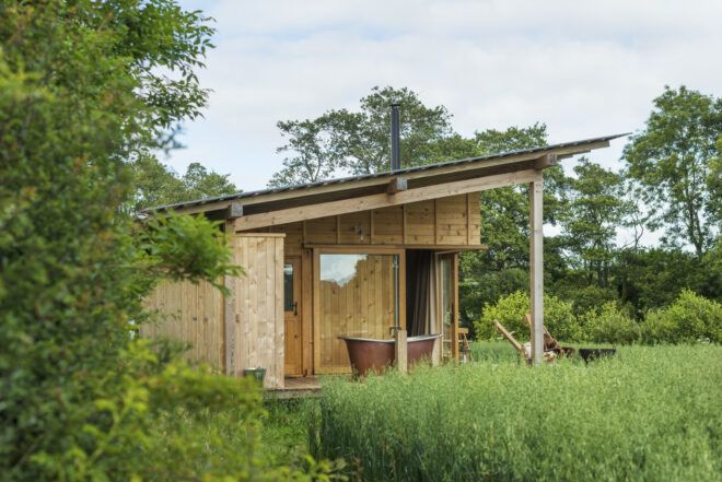wood cabin with angled roof