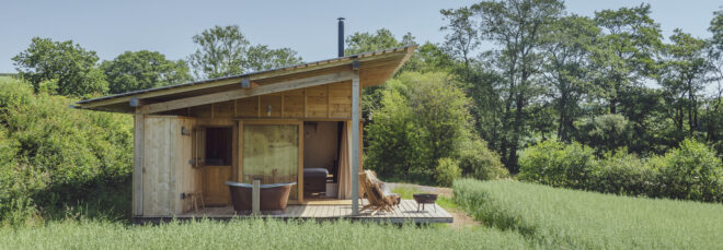 wood cabin with angled roof