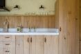 kitchen with wood cabinets and white counters