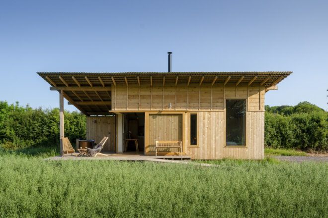 wood cabin with extended roof eaves
