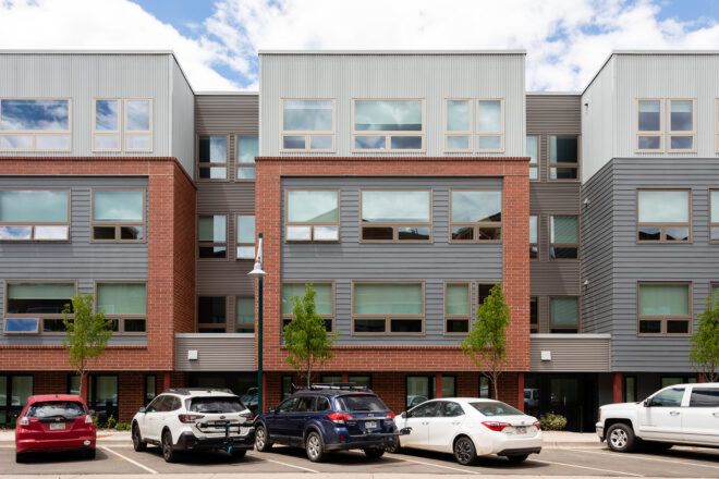 red, gray and white housing complex