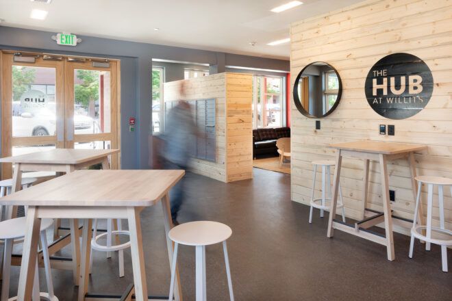 lobby with blue wall and wood accents