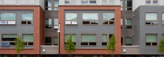 red, gray and white housing complex
