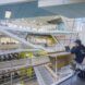 college students sitting at desk on balcony overlooking double-height lobby