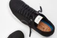 black vegan sneakers with cork lining