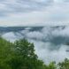 misty mountains and bridge