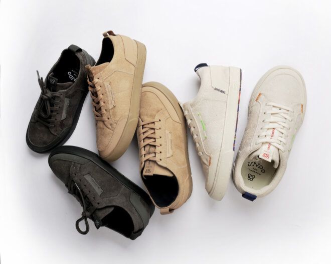 white, black, gray and tan vegan sneakers on white background