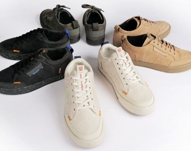white, black, gray and tan vegan sneakers on white background
