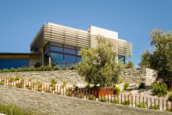 tan house on hill