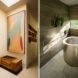 Hallway of art leading to bathroom with steel bathtub