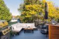 white sectional sofa on rooftop deck