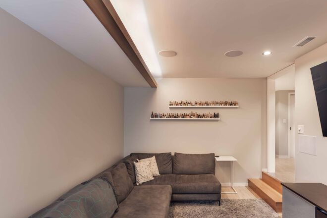 gray sectional sofa in finished basement