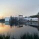 large white building near wetlands