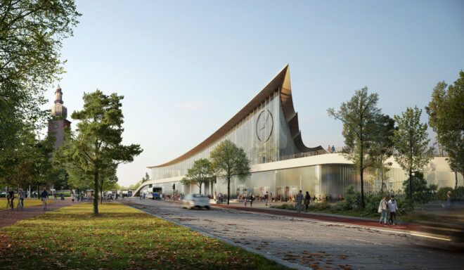 glass building with sloping roof near a bike path
