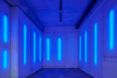 white room lit up with bright blue lights