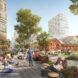 rendering of brick building near glass buildings covered in plants