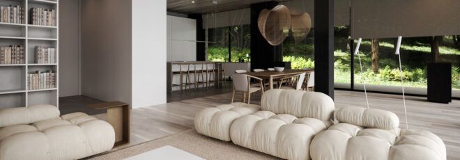 A neutral-toned living room with white sofas.