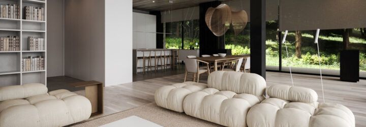 A neutral-toned living room with white sofas.
