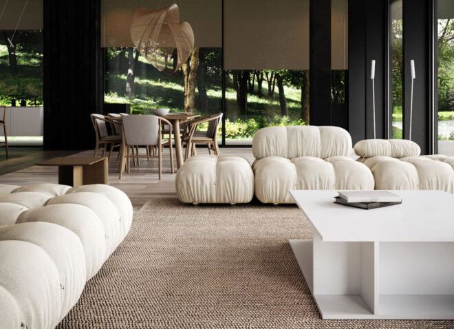 A neutral-toned living room with white sofas.