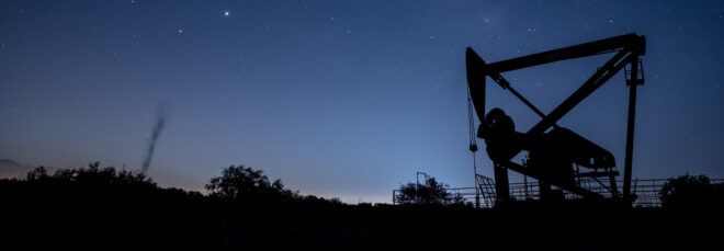 oil rig silhouette at night