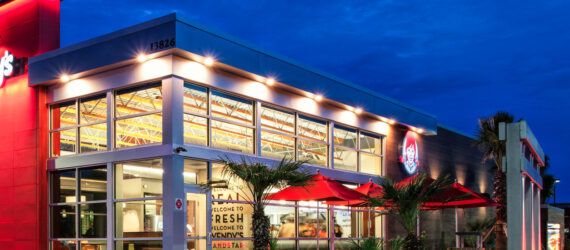 The exterior of a Wendy's restaurant at night.