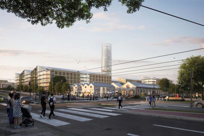 A rendering of the streetview of the Olympic Village, showing a cross walk in front of several buildings that form a zigzagging roofline.